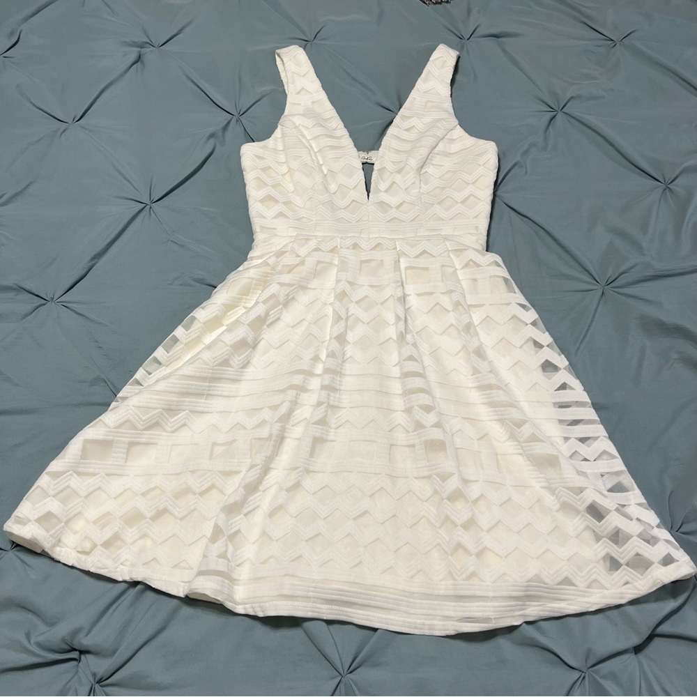 White Textured V‑Neck Mini Dress